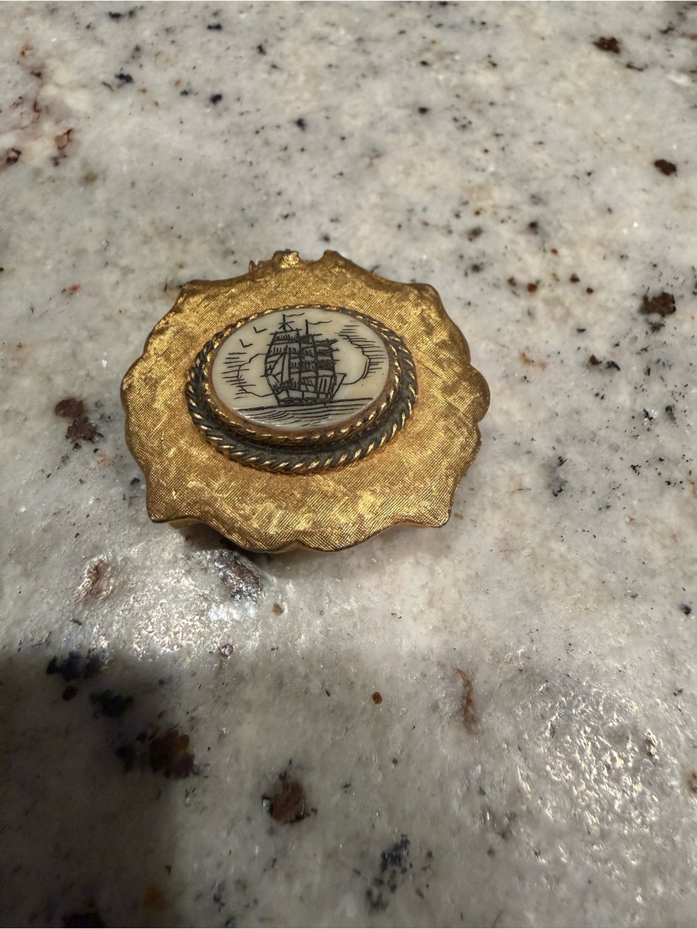Vintage gold-tone metal pill or trinket box